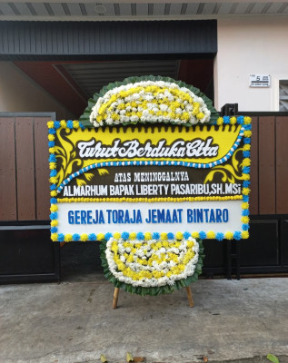 Papan Bunga Duka di Selapajang Jaya